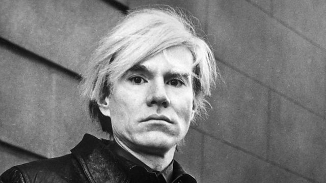 Black and white photo of Andy Warhol.